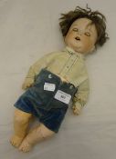 An Armand Marseille bisque headed doll