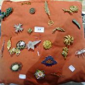 A collection of brooches