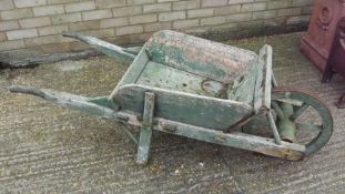 A vintage wooden wheelbarrow