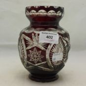 A ruby flashed cut glass vase