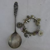 A Norwegian silver spoon and a bracelet