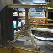 A Victorian tripod table