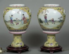 A pair of Chinese famille jaune porcelain lamps Each of two part form,