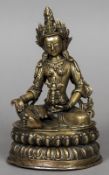 A coral and turquoise set antique bronze model of Buddha Typically modelled seated,