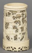A late 19th century Cantonese carved ivory brush pot Carved in the round with figures and pagodas