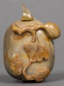 A Chinese carved hardstone snuff bottle Modelled as a fruit. 6 cm high.