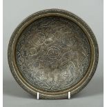 An 18th/19th century Cairo ware dish The interior with scrolling white metal onlays,