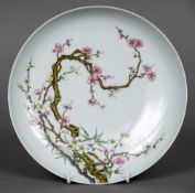 A Chinese porcelain dish The shallow bowl well painted with flowering blossom,