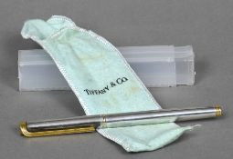 A Tiffany & Co Sterling silver cased Diplomat fountain pen With 18 ct gold nib. 14 cm long.