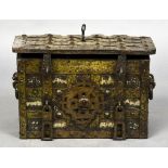 A 17th century iron bound Armada chest Of typical rectangular top locking hinged form,