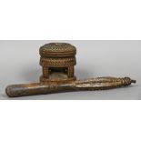 A 19th/20th century tribal African wood pestle and mortar Both worked with geometric decoration.