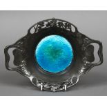 An enamel decorated English pewter pierced twin handled dish,