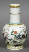 A Chinese porcelain vase The lappet decorated elongated neck above two bands of geometric and