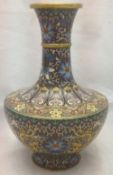 A Chinese cloisonne vase Decorated with mythical beasts amongst lotus strapwork. 23.5 cm high.