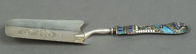 A Russian enamel decorated silver cake slice The blade with scrolling engraved decoration and with