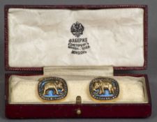 A pair of Russian enamel decorated and diamond set gold cufflinks Each decorated to the front with