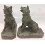 A pair of 19th century Italian stone, possibly serpentine, dogs of Alcibiades,