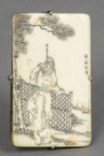 A Chinese silver mounted ivory clip Of thin tablet form, carved with scholars in a garden, signed.