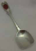 An early Arts & Crafts type silver caddy spoon, hallmarked London 1842,