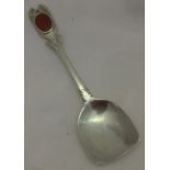 An early Arts & Crafts type silver caddy spoon, hallmarked London 1842,