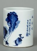 A Chinese porcelain blue and white brush pot Decorated with foliage and with further calligraphic