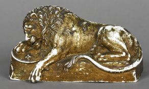 A 19th century Continental porcelain model of the Lion of Lucerne Typically modelled with gilt