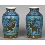 A pair of 19th century Japanese cloisonne on porcelain vases Each decorated with floral sprays,