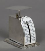 A set of Edwardian silver postal scales, hallmarked Birmingham 1906,