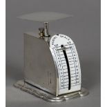 A set of Edwardian silver postal scales, hallmarked Birmingham 1906,