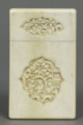 A late 19th century Canton carved ivory card case Of plain slender rectangular form,