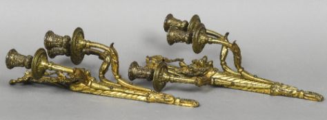 A pair of gilt bronze wall sconces Each with ribbon tied top above the spiralled stem issuing three