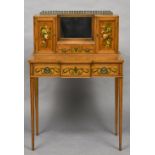 An Edwardian painted satinwood bonheur du jour The brass galleried top above a mirror and a frieze