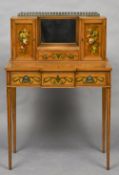 An Edwardian painted satinwood bonheur du jour The brass galleried top above a mirror and a frieze