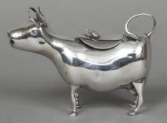 A Dutch Export Sterling silver cow creamer Typically modelled. 10 cm high.