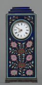 An enamel decorated 925 silver desk clock Of stepped rectangular form with scrolling floral