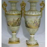 A pair of Continental porcelain twin handled vases Each decorated with Oriental figures in a