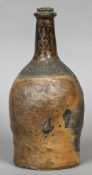 An 18th/19th century Continental stoneware bottle The neck with tortoiseshell glaze. 29.5 cm high.