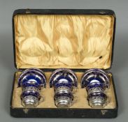 A Crown Staffordshire pottery silver mounted tea set, the mounts hallmarked London 1900 and 1901,