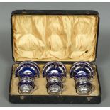 A Crown Staffordshire pottery silver mounted tea set, the mounts hallmarked London 1900 and 1901,