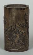 A Chinese carved bamboo brush pot Of cylindrical form,