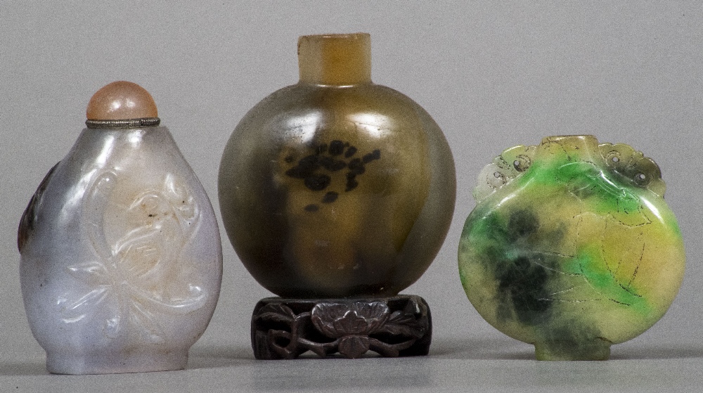 A Chinese agate snuff bottle Of typical rounded form,