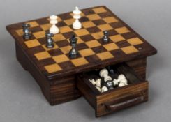 An ivory and stained ivory Staunton pattern chess set, circa 1900 One side natural in colour,