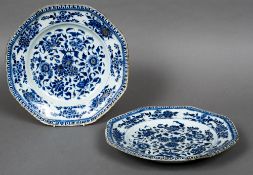 A pair of 18th century Chinese gilded blue and white dishes Each of octagonal scalloped form,