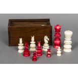 An early 19th century Anglo-Indian mono-block turned ivory and stained ivory chess set The Kings