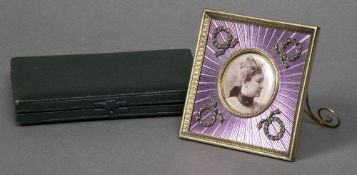 A Russian purple guilloche enamel decorated silver gilt photograph frame Of square form set with