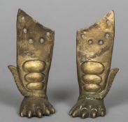 A pair of Chinese gilt metal mounts Formed as mythical beast on four legs. 13 cm long.