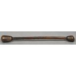 A large 19th century treen grain pestle/pounder Of typical large double ended form. 106 cm long.