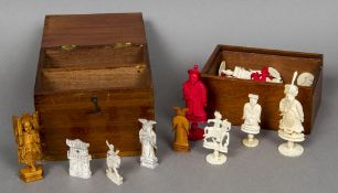 Two 19th century Chinese carved ivory figural chess sets One red and white,