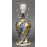 An Indian Kashmiri papier mache lamp base Spiral moulded and decorated with blue and gilt strapwork,
