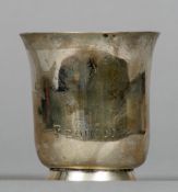 An antique Continental silver beaker Of flared form with a spreading foot,